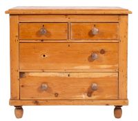 A pine chest of drawers,