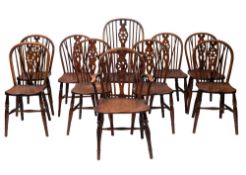 An associated set of ten elm, ash and beech wheelback chairs,