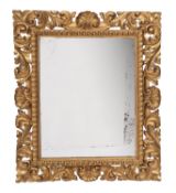 A carved and gilt pine framed wall mirror in late 17th century Florentine style,