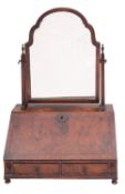 A Queen Anne walnut table bureau, adapted as dressing table mirror,
