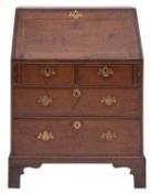 An early George III oak and crossbanded bureau,