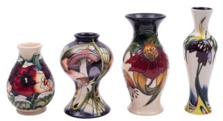 Four John Moorcroft pottery vases,