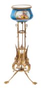 A Continental gilt metal and Paris style porcelain mounted tripod jardinière stand in Pompeiian