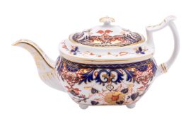 A Derby porcelain teapot, of oval form set on bun feet and decorated in the Imari pattern,
