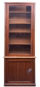 A pitch pine and glazed cabinet bookcase,