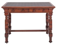 A Victorian red walnut writing table, by Gillow & Co.