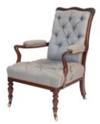 A Victorian rosewood and upholstered library elbow chair,