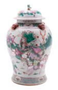 A Chinese famille rose baluster jar and cover with lion dog finial and handles,