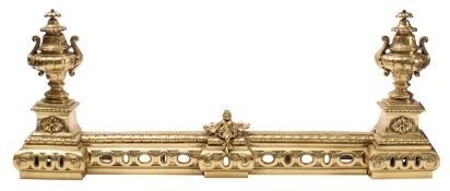 A brass adjustable fender in Louis XVI taste,