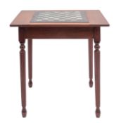 A mahogany and marble inset games table in Regency taste,
