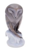A Royal Copenhagen figure of a Barn Owl on snow covered mound base,