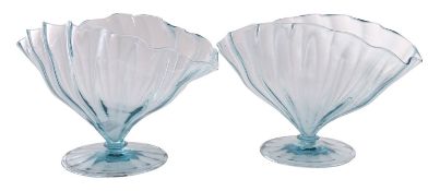 A pair of Powell & Sons Whitefriars green glass tazzas and a pair of pale blue fan shaped vases,