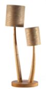 Peter Lanyon [Contemporary] an ash double stem table lamp with ash shades, 87cm high.