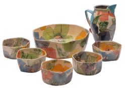 *Paul Jackson [Contemporary], a group of terracotta of polygonal form comprising a jug,25cm high,