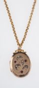 A Victorian gold belcher chain and a gold front and back locket set with paste stones, weight 8.
