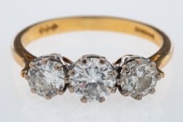 WITHDRAWN A three stone diamond ring, set with brilliant cut diamonds, the centre stone, 0.