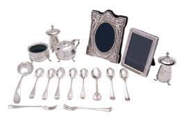 An Edwardian silver baluster four piece cruet set by Constantine & Floyd Ltd, Birmingham 1903,