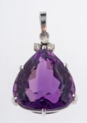 An amethyst & diamond pear form pendant. set in 18ct white gold, total diamond weight 0.
