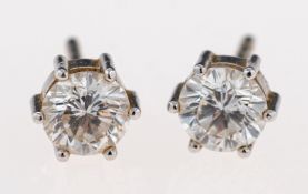 A pair of diamond single stone earrings, the brilliant cut diamonds, estimated to weigh 1.