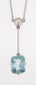 An aquamarine and pearl pendant, the rectangular cut aquamarine claw set below a seed pearl,