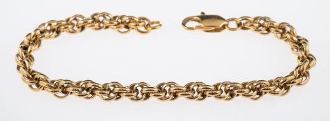 A gold fancy link bracelet, length 18 cm, testing as 14 ct gold.