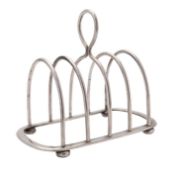 A Victorian silver toast rack by Hukin & Heath (John Thomas Heath & John Hartshorne Middleton),