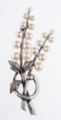 A Mikimoto pearl brooch in the form of a floral spray, signed,