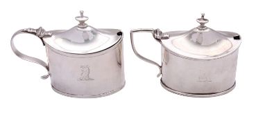 Two similar George III silver mustard pots by William Abdy II, London 1801 and 1810,