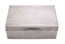 A silver cigarette box by Asprey & Co.