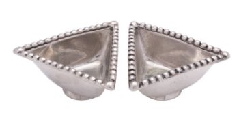 A matched pair of Scottish silver triangular dishes probably by Robert Sawers Ltd,