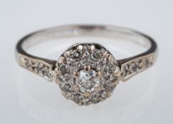 A diamond cluster ring,