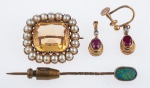 A Victorian citrine and seed pearl brooch in unmarked gold,