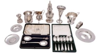 A Victorian silver baluster cream jug, maker's mark rubbed, Birmingham 1898, with lion capped feet,