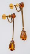 A pair of tangerine citrine set drop earrings, set in unmarked gold, screw fittings, length 4.