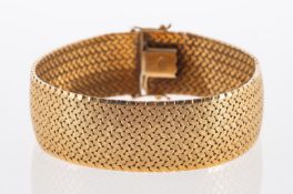 A fine vintage Norwegian gold bracelet of woven flat links with satin finish and bright borders,
