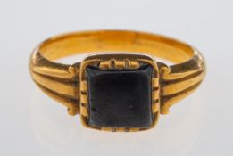 An antique gold signet ring set with black jasper, in hand crafted high carat gold setting,