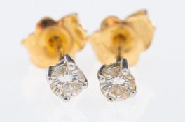 A pair of diamond solitaire earrings, brilliant cut diamonds, total 0.