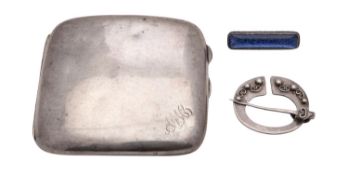 A George V silver cigarette case by Charles Cooke, Chester 1918, of shaped square form,