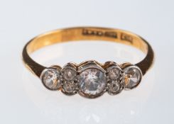 A Vintage white sapphire ring in platinum and 18ct gold mount,