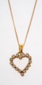A heart form pendant set with diamonds, on fine chain 18ct gold .