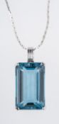 A blue topaz pendant, the rectangular faceted stone of good 'sea blue/green' colour,