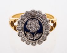 A vintage diamond and enamel set ring hallmarks for 18ct London 1975,