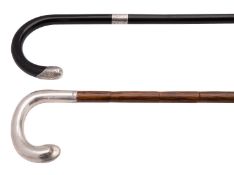 Two silver mounted walking sticks,