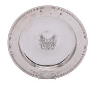 A Elizabeth II silver Armada dish by Mappin and Webb, London 1961, of circular dished form,
