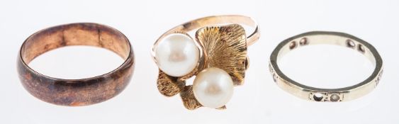 A rose gold band ring hallmarked 9ct, a two stone cultured pearl ring,