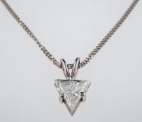 A triliant cut diamond pendant, set in 18ct white gold, on fine chain, estimated 1.