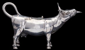 A German silver cow creamer, stamped STERLING, GERMANY and 925, 1950s,
