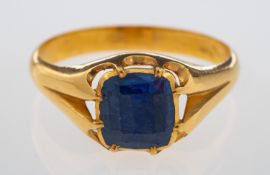 A fine gold ring set with a faceted sapphire of good colour, closed back claw setting, unmarked,