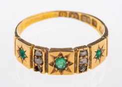A Victorian band ring set with small emerald and rose cut diamonds, 18ct gold,