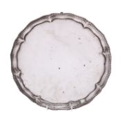 A late Victorian silver salver by Charles Stuart Harris, London 1892, shaped circular form,